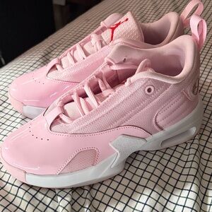 Jordan Max Aura 6 (GS) in the Pink Foam/Fire Red colorway.